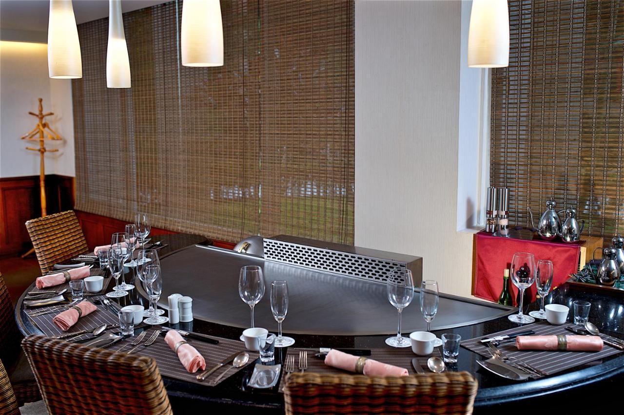 ホテル ロイヤル チーペン Wenquan エクステリア 写真 A restaurant in the hotel